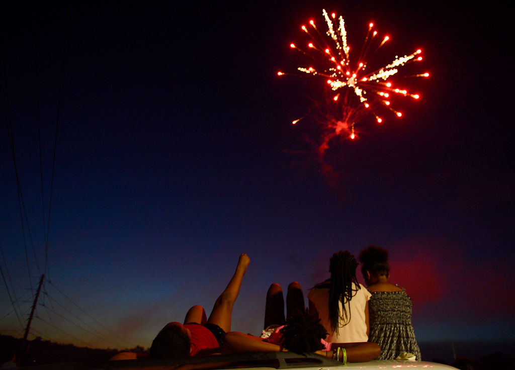 J'liyah Dudley, 6, Darieona Kelly, 11, Jaybrielle Dudley, 8, Kylley Hayes, 8, watch the Spirit of '76 firework family night show